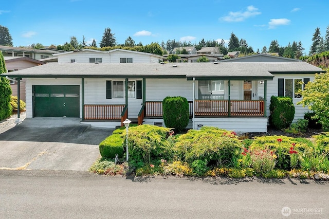 2500 Alder St Unit 335, Milton, WA 98354 - single story home with an attached garage, asphalt driveway, and a shingled roof