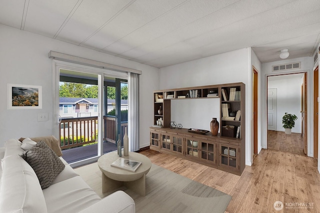 2500 Alder St Unit 335, Milton, WA 98354 - living room featuring wood finished floors