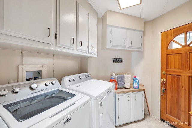 2500 Alder St Unit 335, Milton, WA 98354 - washroom featuring washer and clothes dryer, cabinet space, and light tile patterned flooring
