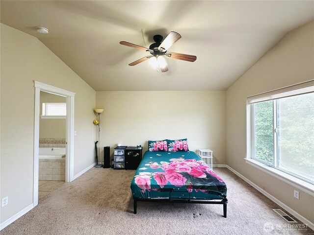 27120 105th Pl SE, Kent, WA 98030 - carpeted bedroom with vaulted ceiling, ensuite bath, and ceiling fan