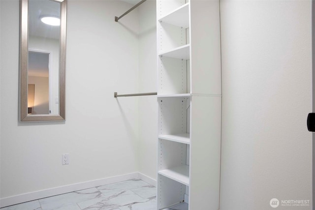 10761 Bill Point Crst NE, Bainbridge Island, WA 98110 - spacious closet with marble look tile flooring