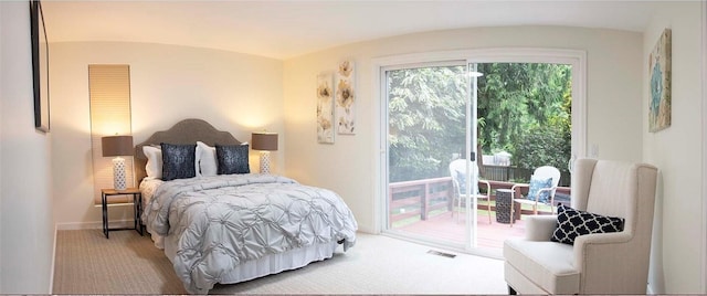 10761 Bill Point Crst NE, Bainbridge Island, WA 98110 - carpeted bedroom featuring access to exterior and baseboards