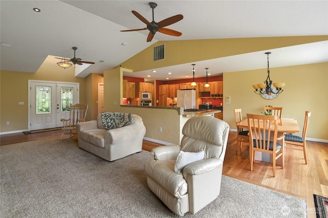 2360 Sapp Rd SW, Tumwater, WA 98512 - living room with ceiling fan, lofted ceiling, a chandelier, light wood-style flooring, and recessed lighting
