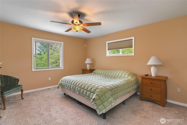 2360 Sapp Rd SW, Tumwater, WA 98512 - bedroom featuring multiple windows, carpet flooring, and a ceiling fan