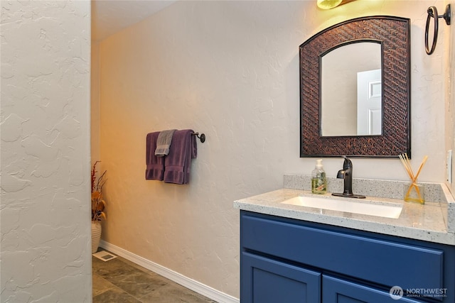 2360 Sapp Rd SW, Tumwater, WA 98512 - bathroom featuring vanity and marble look tile flooring