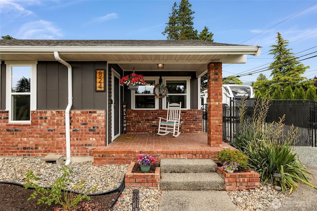 824 Orth Way, Sedro Woolley, WA 98284 - entrance to property with covered porch, board and batten siding, brick siding, and a shingled roof