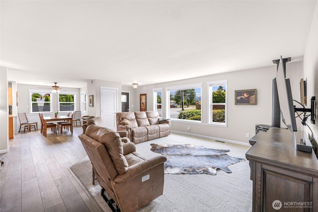 824 Orth Way, Sedro Woolley, WA 98284 - living area with light wood-type flooring and a ceiling fan