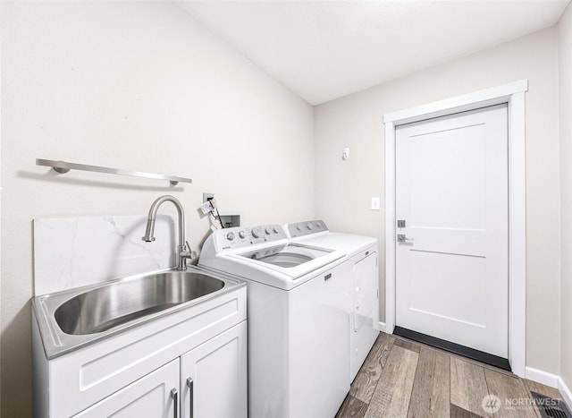 824 Orth Way, Sedro Woolley, WA 98284 - laundry room with cabinet space, washing machine and dryer, and light wood finished floors