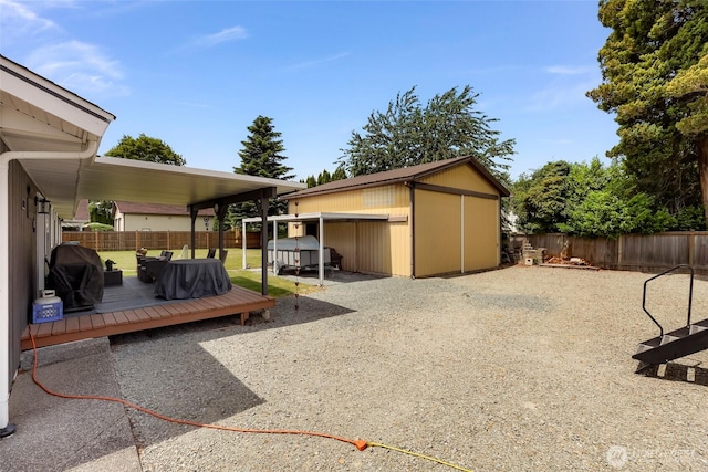 824 Orth Way, Sedro Woolley, WA 98284 - fenced backyard with a deck, area for grilling, and a storage shed