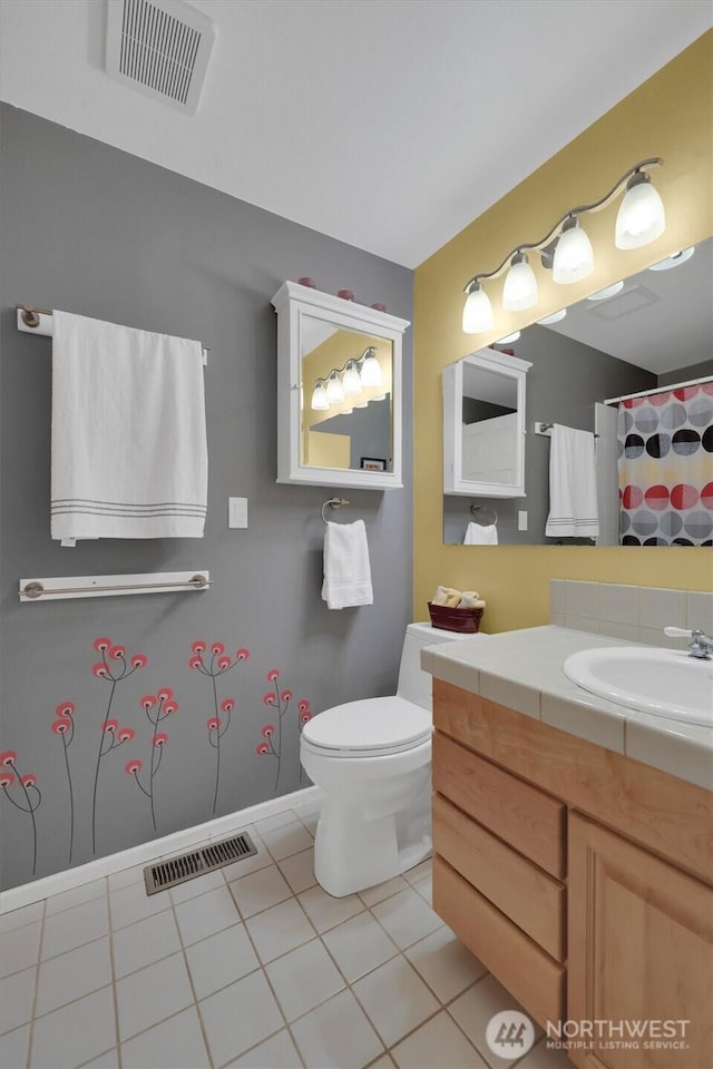 2212 186th Ave NE, Redmond, WA 98052 - bathroom with vanity, tile patterned floors, and a shower with shower curtain