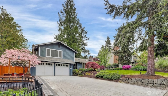 2212 186th Ave NE, Redmond, WA 98052 - view of front of home with an attached garage and driveway