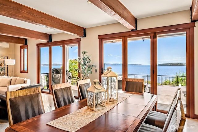 6117 39th Dr NW, Marysville, WA 98271 - tiled dining space featuring beamed ceiling and a water view