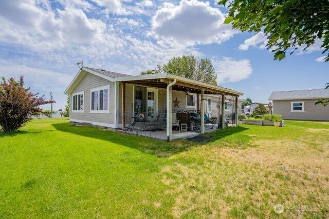 1448 Rd C NE, Moses Lake, WA 98837 - back of house featuring a yard, a patio, and crawl space