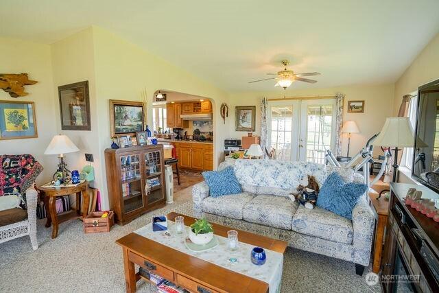 1448 Rd C NE, Moses Lake, WA 98837 - living area with french doors, ceiling fan, and light colored carpet