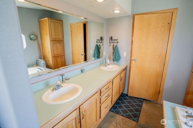 1448 Rd C NE, Moses Lake, WA 98837 - bathroom with double vanity and a tub
