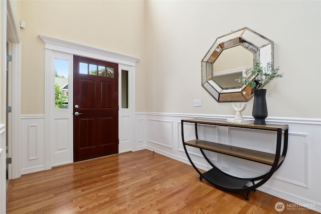 24826 SE 22nd Ct, Sammamish, WA 98075 - foyer featuring wainscoting, a decorative wall, and light wood-style floors