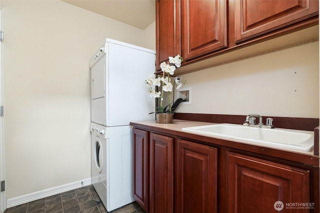 24826 SE 22nd Ct, Sammamish, WA 98075 - laundry area with stacked washer and clothes dryer and cabinet space