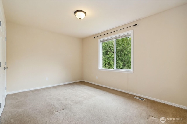24826 SE 22nd Ct, Sammamish, WA 98075 - spare room featuring carpet and baseboards