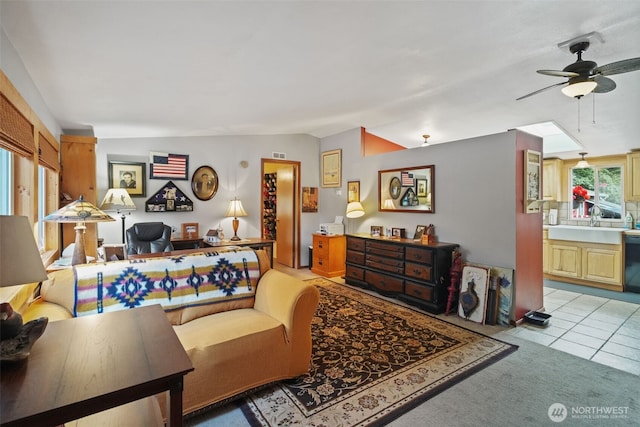6338 Kirsop, Olympia, WA 98512 - living room featuring ceiling fan, light carpet, and light tile patterned floors