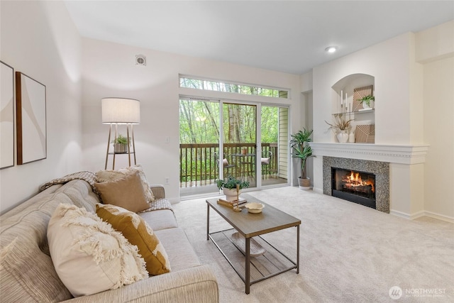 9229 122nd Ct NE Unit C-13, Kirkland, WA 98033 - living room featuring a fireplace and carpet