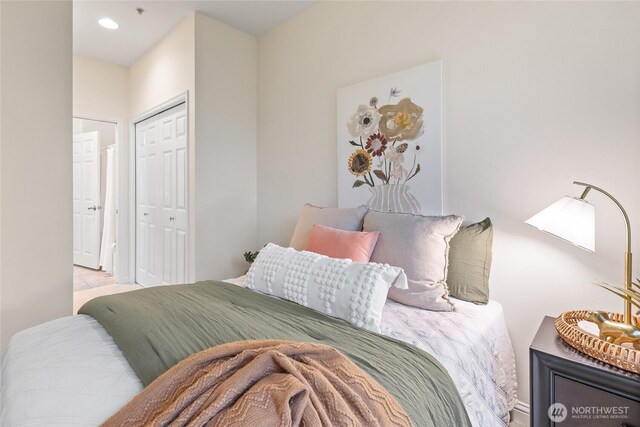 9229 122nd Ct NE Unit C-13, Kirkland, WA 98033 - bedroom featuring a closet and recessed lighting