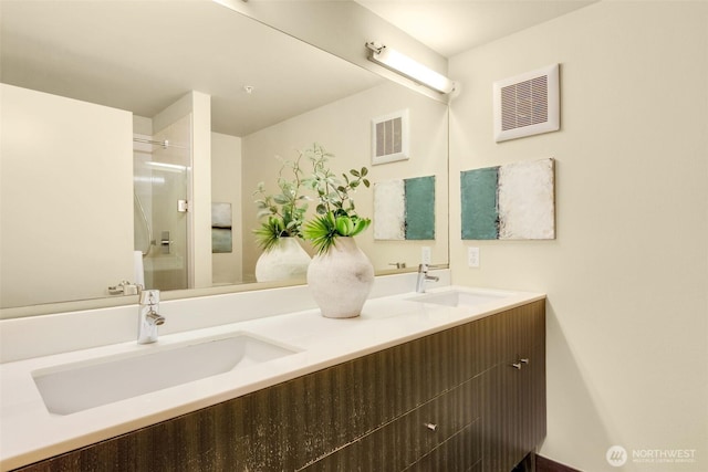 530 Broadway E Unit 130, Seattle, WA 98102 - bathroom featuring double vanity and an enclosed shower