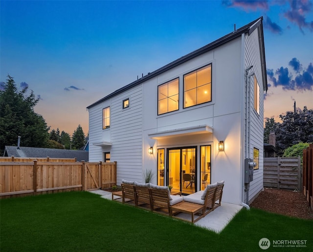 9224 36th Ave SW Unit 2, Seattle, WA 98126 - back of property featuring outdoor lounge area, a fenced backyard, and a gate