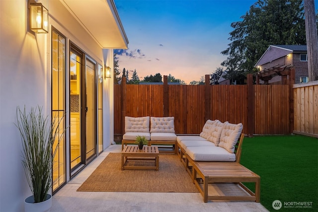 9224 36th Ave SW Unit 2, Seattle, WA 98126 - patio terrace at dusk featuring outdoor lounge area, a fenced backyard, and a patio