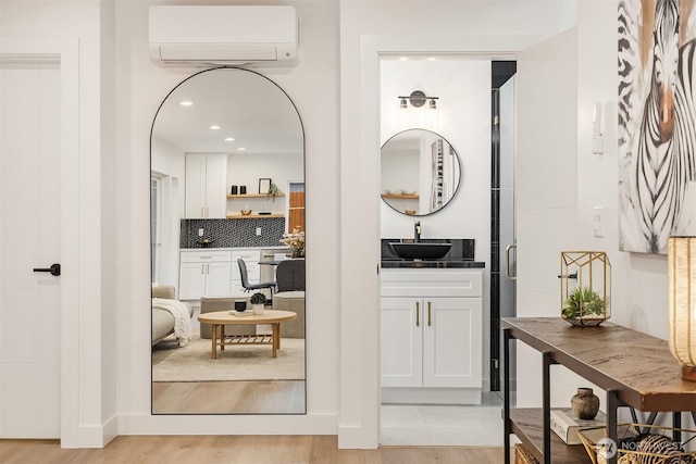 9224 36th Ave SW Unit 2, Seattle, WA 98126 - corridor featuring a wall unit AC and recessed lighting