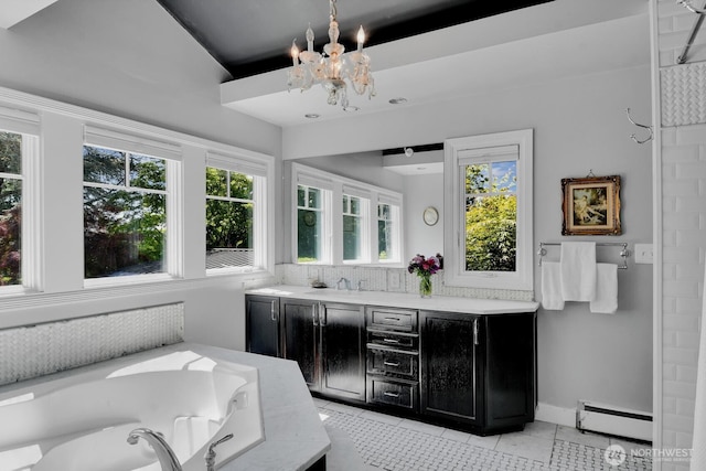 16525 39th Ave NE, Lake Forest Park, WA 98155 - full bathroom with baseboard heating, tile patterned floors, and healthy amount of natural light