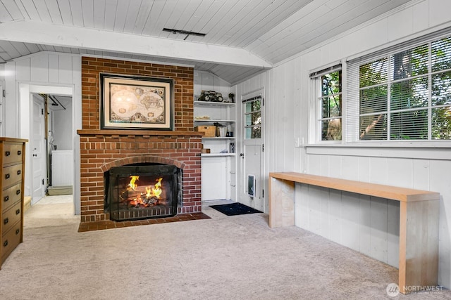 16525 39th Ave NE, Lake Forest Park, WA 98155 - unfurnished living room with lofted ceiling, carpet flooring, a fireplace, wooden ceiling, and wood walls