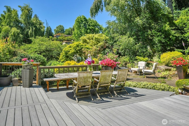 16525 39th Ave NE, Lake Forest Park, WA 98155 - wooden terrace with outdoor dining space and view of scattered trees