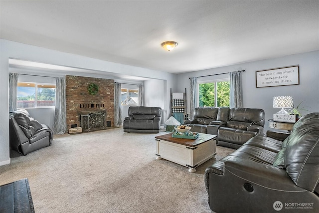 6621 125th Street Ct E, Puyallup, WA 98373 - living room featuring healthy amount of natural light, carpet flooring, and a brick fireplace