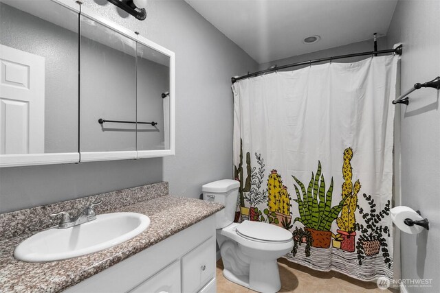 6621 125th Street Ct E, Puyallup, WA 98373 - bathroom featuring vanity and curtained shower