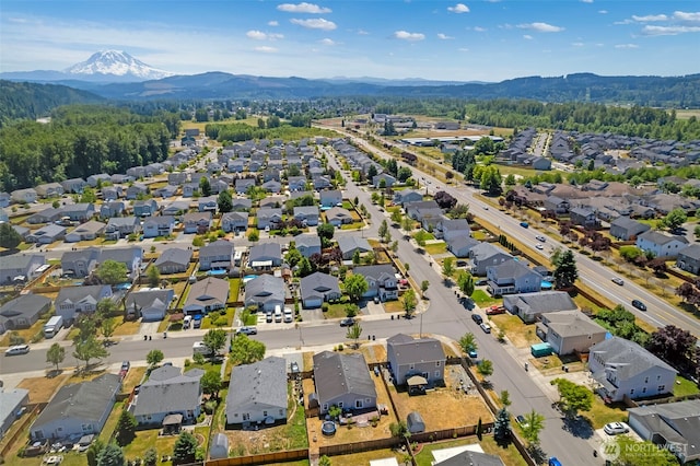 109 Nelsen St NE, Orting, WA 98360 - aerial view of residential area with a mountainous background