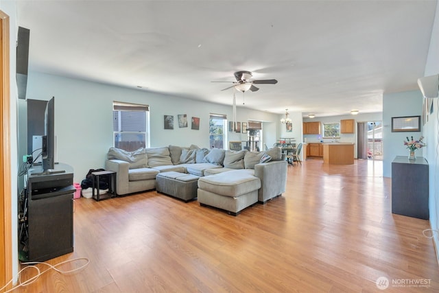 109 Nelsen St NE, Orting, WA 98360 - living area featuring ceiling fan, healthy amount of natural light, and light wood-type flooring