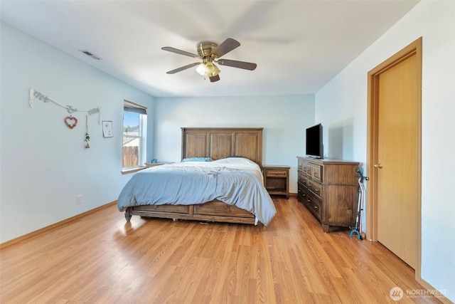 109 Nelsen St NE, Orting, WA 98360 - bedroom with light wood-type flooring and a ceiling fan