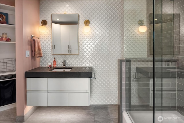 6411 View St NE, Tacoma, WA 98422 - bathroom featuring vanity and a shower with door