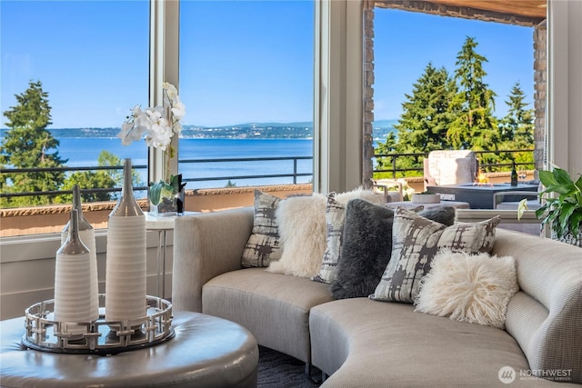 6411 View St NE, Tacoma, WA 98422 - living area featuring a water view and plenty of natural light