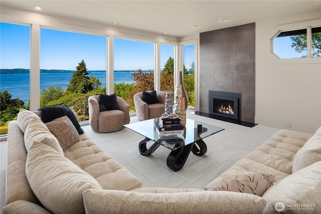 6411 View St NE, Tacoma, WA 98422 - living area featuring a water view, a fireplace, and recessed lighting