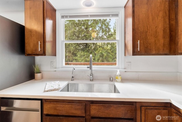 4530 Vacca Ln, Bellingham, WA 98226 - kitchen featuring dishwasher, light countertops, and brown cabinets