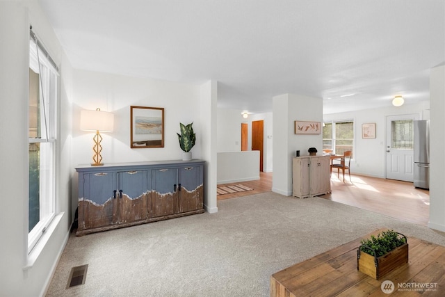 4530 Vacca Ln, Bellingham, WA 98226 - carpeted living area featuring baseboards and an office area