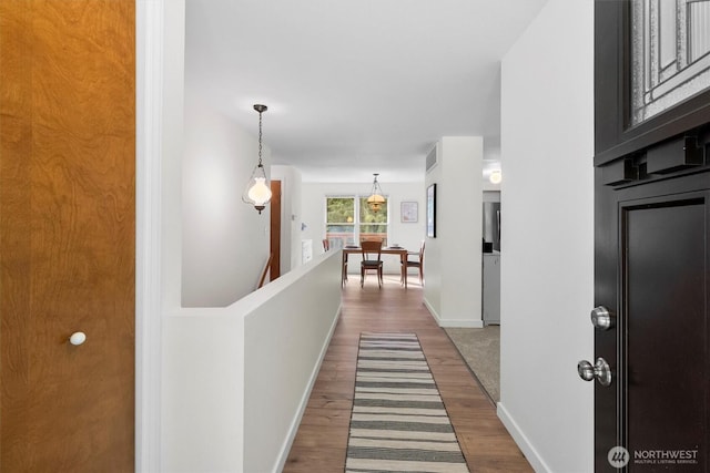 4530 Vacca Ln, Bellingham, WA 98226 - hall featuring wood finished floors and an upstairs landing