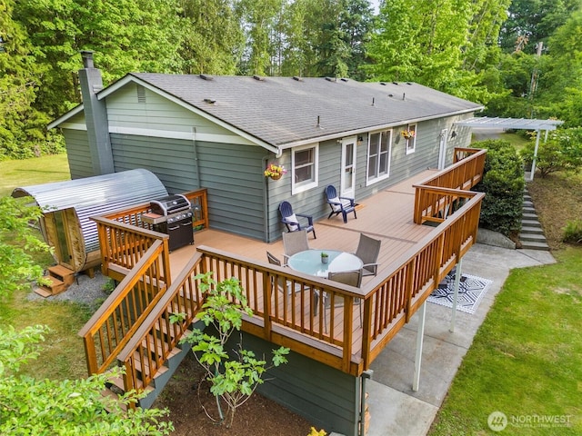 4530 Vacca Ln, Bellingham, WA 98226 - rear view of house featuring stairs, roof with shingles, a wooden deck, and a chimney