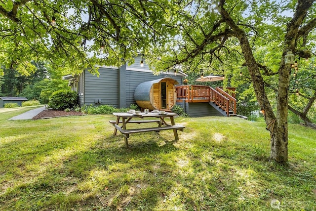 4530 Vacca Ln, Bellingham, WA 98226 - view of green lawn with a wooden deck and stairway