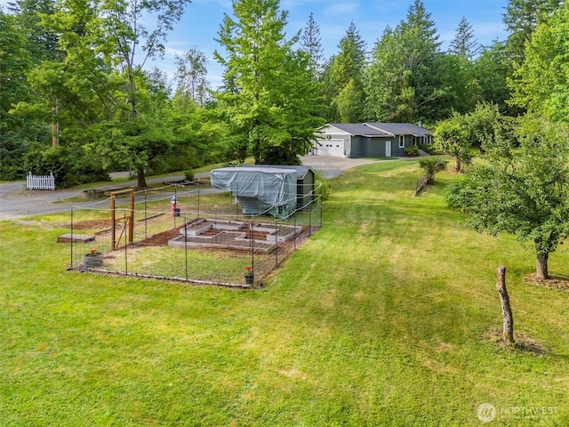 4530 Vacca Ln, Bellingham, WA 98226 - view of grassy yard featuring a vegetable garden