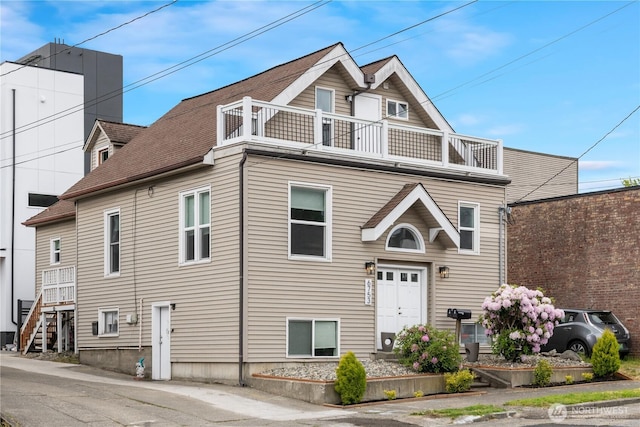 6753 14th Ave NW, Seattle, WA 98117 - view of front of house featuring a balcony