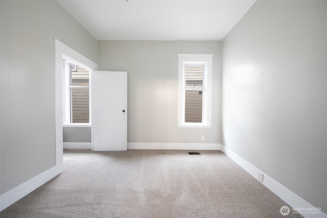 6753 14th Ave NW, Seattle, WA 98117 - carpeted spare room with plenty of natural light