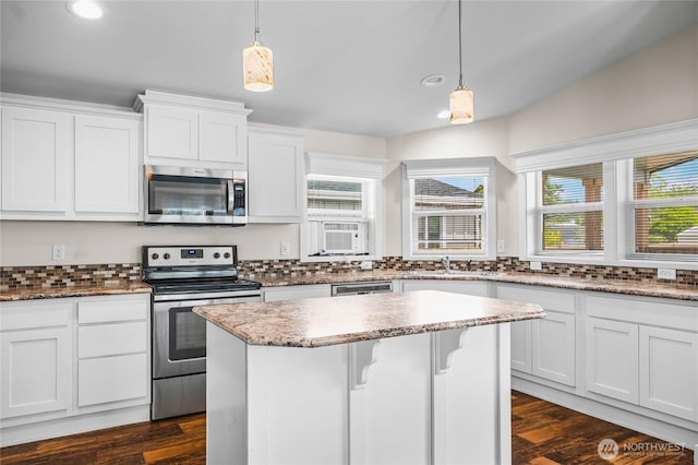 120 L St SE, Auburn, WA 98002 - kitchen with appliances with stainless steel finishes, tasteful backsplash, recessed lighting, cooling unit, and white cabinetry