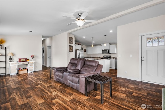 120 L St SE, Auburn, WA 98002 - living area featuring vaulted ceiling, dark wood finished floors, ceiling fan, and recessed lighting